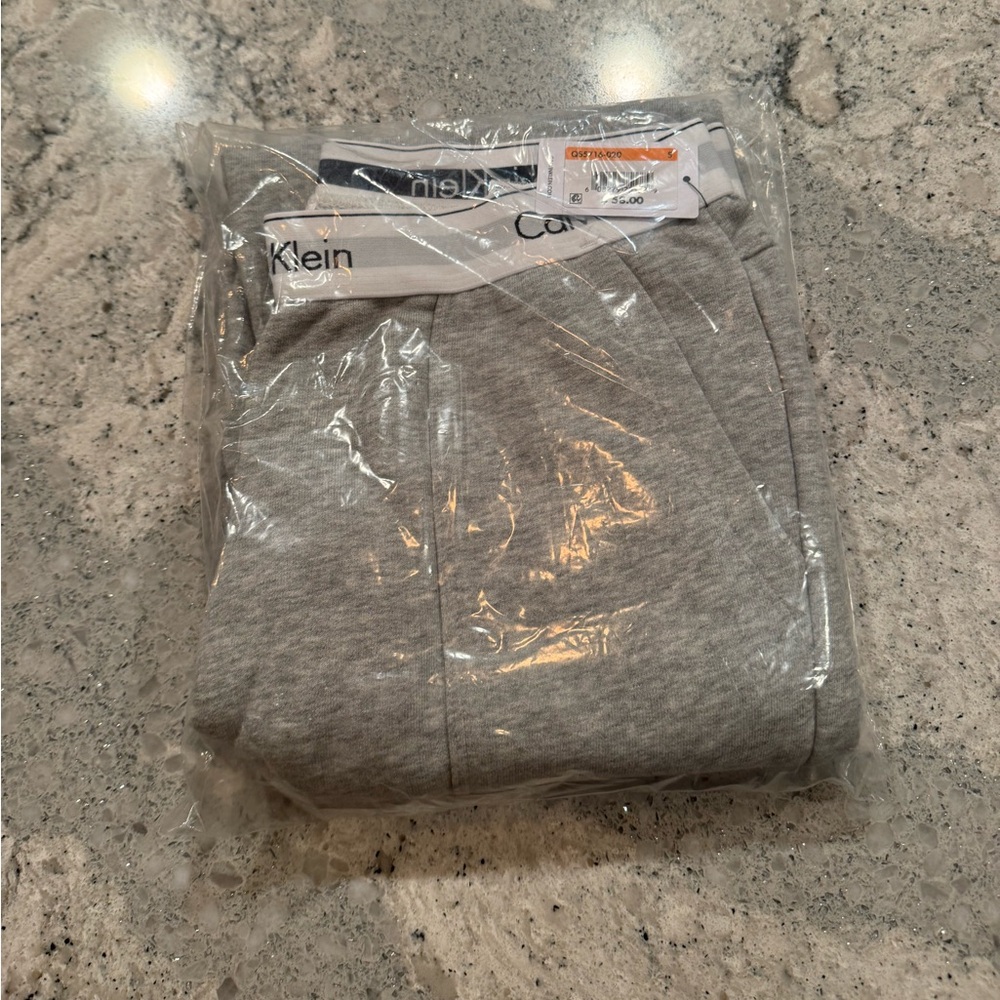 NWT Calvin Klein Gray Joggers with classic CK band and deep pockets